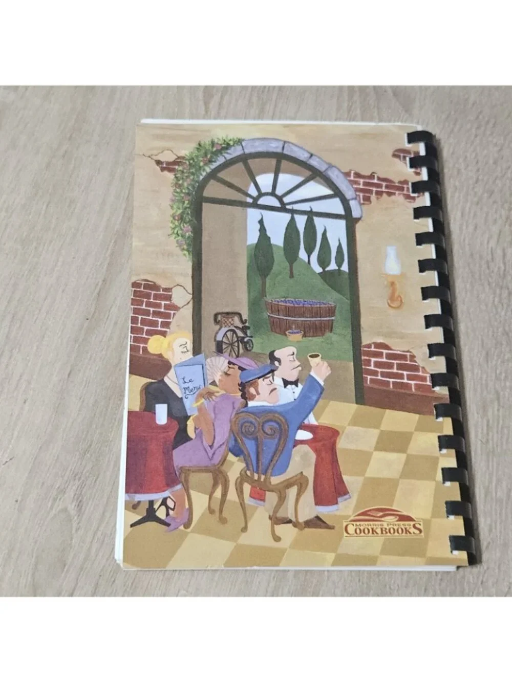284 Cooks Steinmart/ Dignity U Wear Spiral Bound Cookbook 2005
